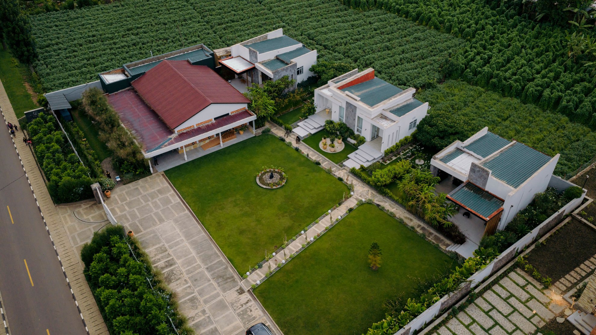 A private garden in Kinigi. Four suites, a quiet lawn, and the volcanoes a short drive from the gate
